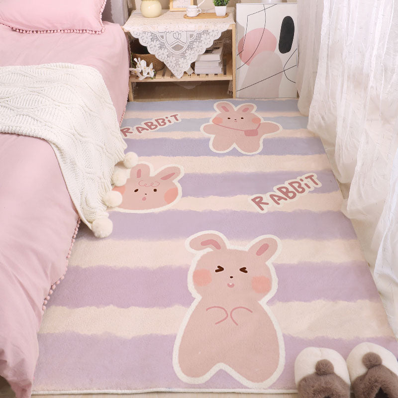 Kids rabbit-themed area rug with purple stripes and pink rabbit outlines.