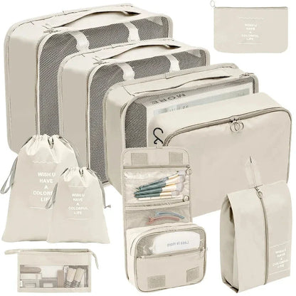 Beige packing cube set with gray mesh organizers and zip pouches for travel storage