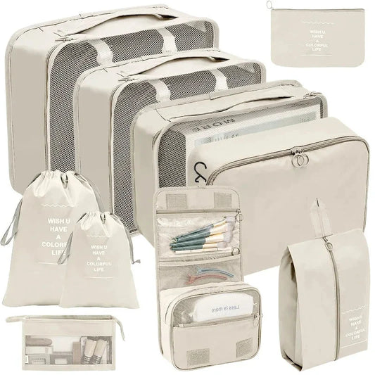 Beige packing cube set with gray mesh organizers and zip pouches for travel storage