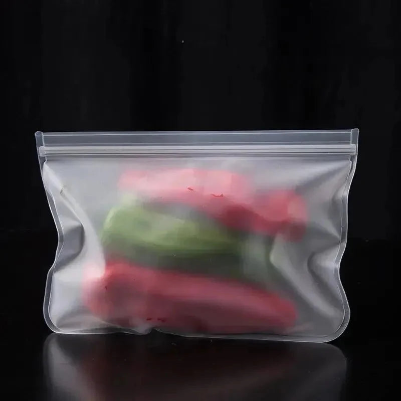 Clear silicone zip-top storage bag with sliced vegetables inside