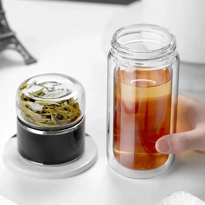 Two-piece clear storage jars with silver caps, one filled with amber liquid