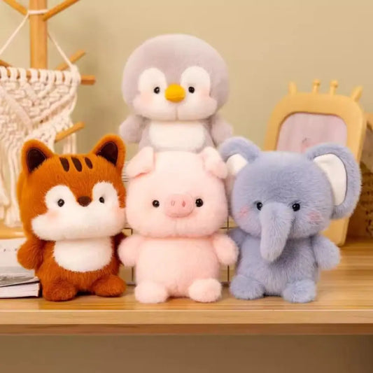 Set of four plush animal desk companions: tiger, pig, elephant, and penguin