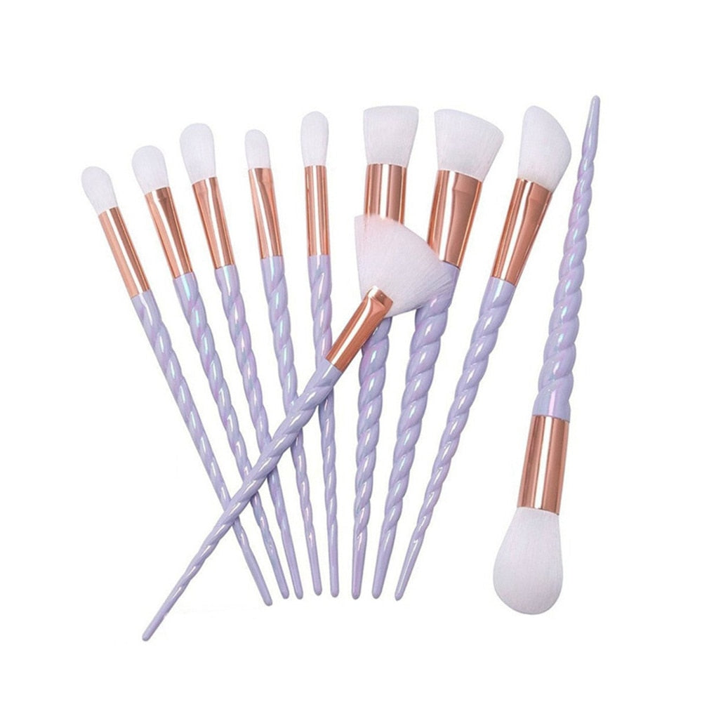 Makeup brush set with light lavender spiral handles, rose-gold ferrules, white bristles