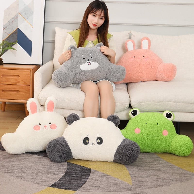 Assorted plush animal cushions: gray husky, pink bunny, panda, green frog, and white bunny.