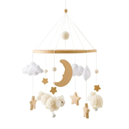 Baby crib mobile with crescent moon, clouds, stars, and knitted plush animals