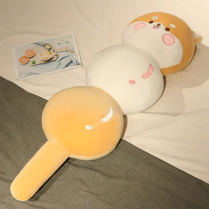 Animal dango snack plush trio with duck beak and bunny-like faces, orange and cream