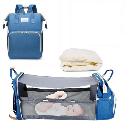 Blue diaper bag backpack with foldable baby bed and front mesh organizer panel