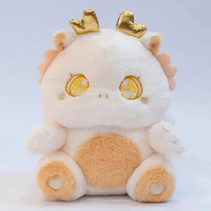 White baby dragon plush with gold star-eye embroidery and small brown heart paws