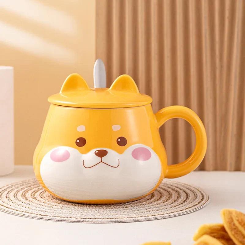 Yellow dog-face mug with lid and side handle, close front view on striped coaster