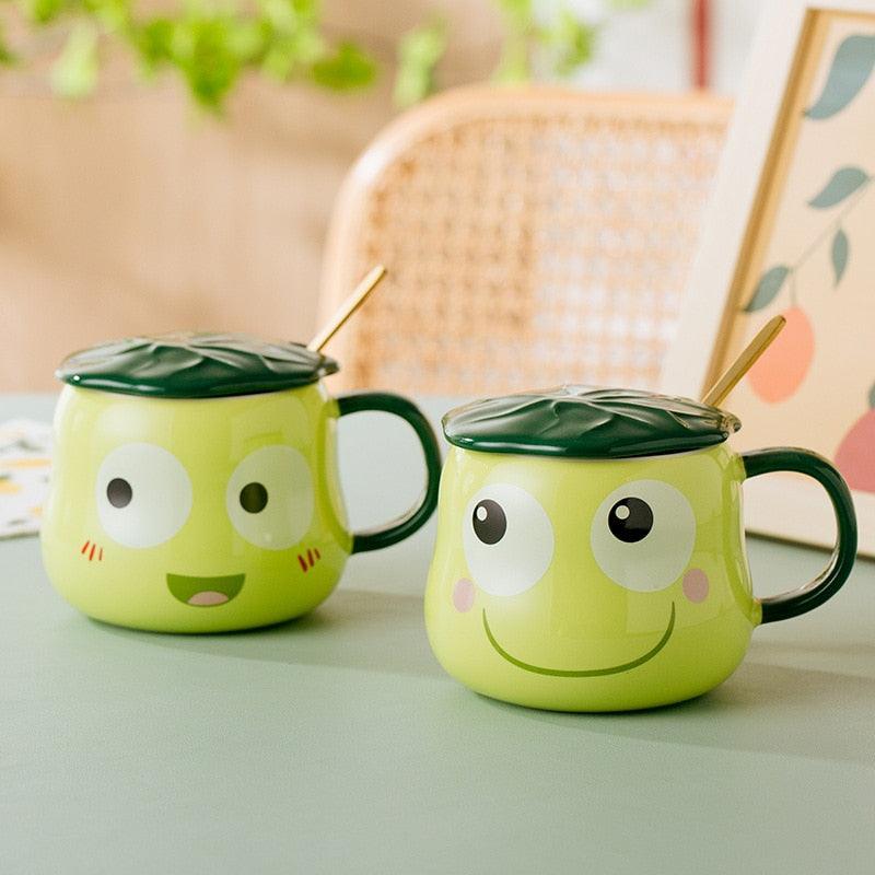 Frog-shaped mugs with lids and spoons, lime green mugs with green handles and frog faces