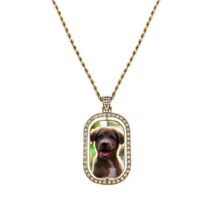 Gold photo pendant necklace with diamond bezel oval frame and puppy portrait charm