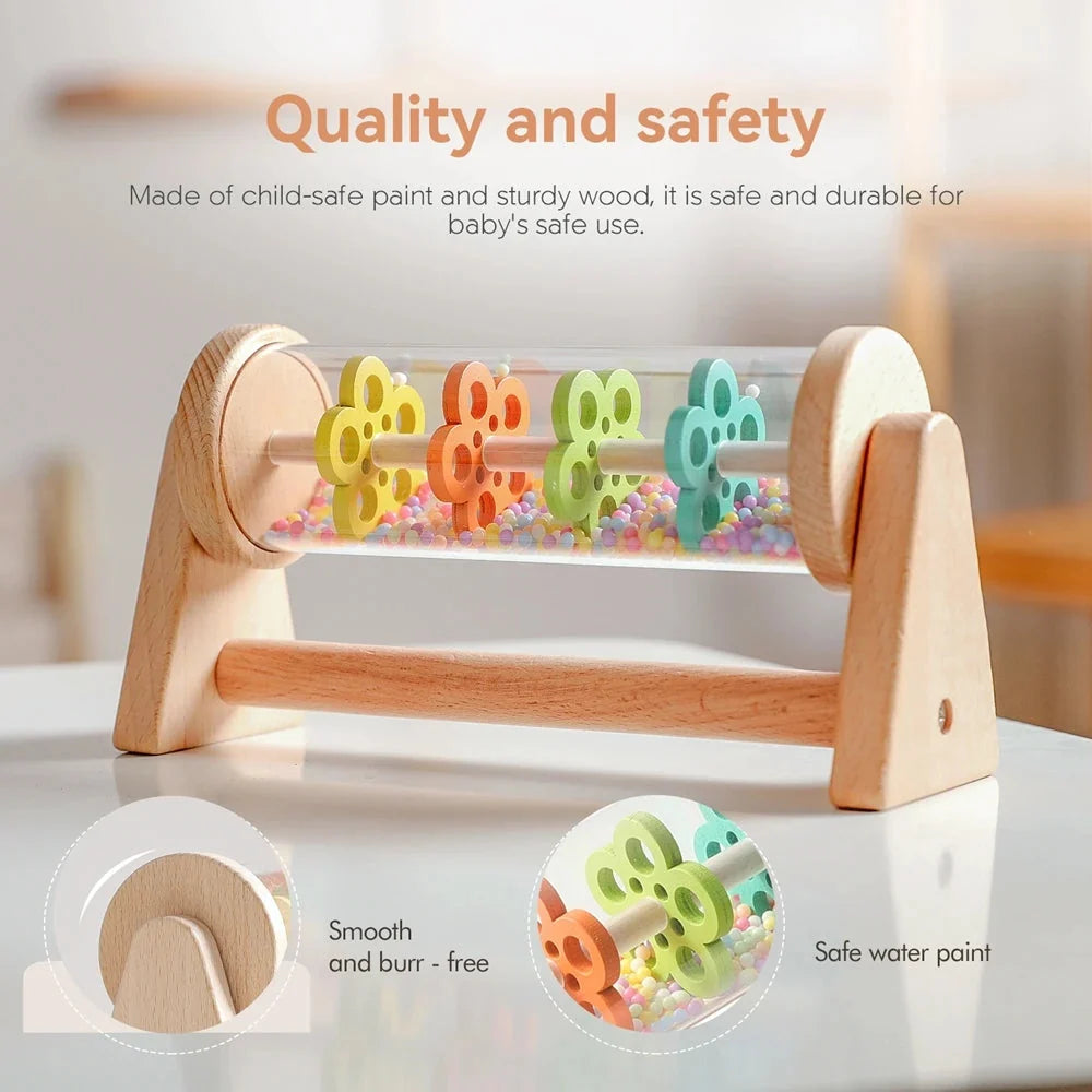 Wooden rain stick sensory toy with multicolor beads and smooth rounded wooden base