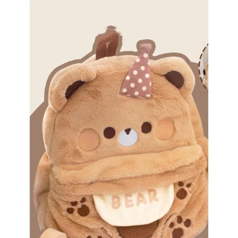 Plush bear backpack light tan with bear face applique, polka-dot bow, and paw prints
