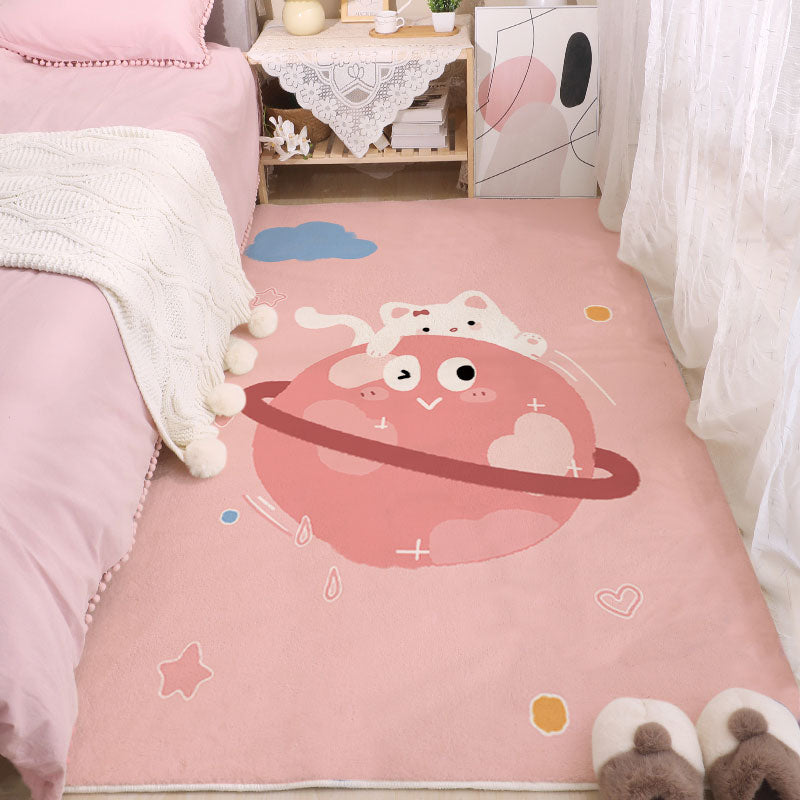 Pink cartoon space area rug with planet character and small hearts
