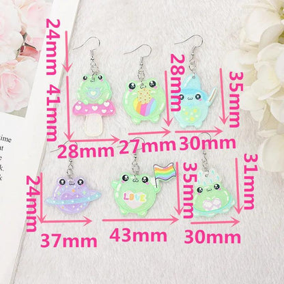 Frog acrylic earrings color chart on display card showing multiple frog styles and silver hooks