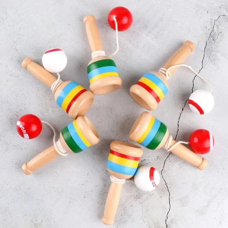 Wooden skill cup throw-and-catch toy set with striped cups and red/white balls