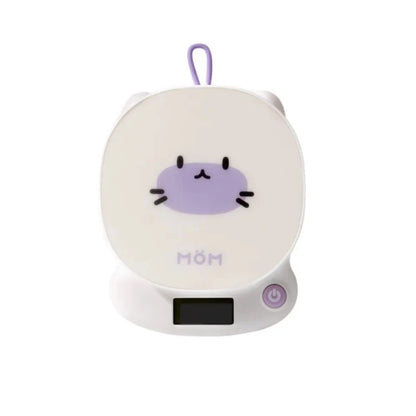Cat digital kitchen scales with cream round face, LCD display and purple control button
