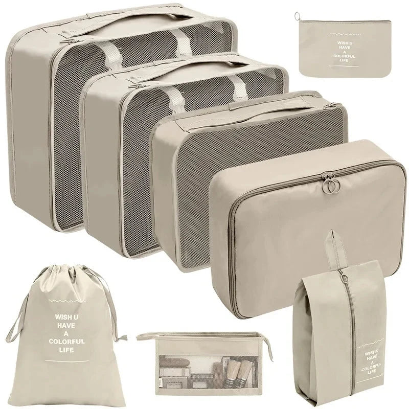 Beige travel packing organizer cubes set with mesh tops and matching zip pouches