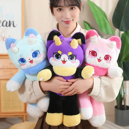 Three dragon cat plush toys held together: light blue, purple, and pink, cute faces
