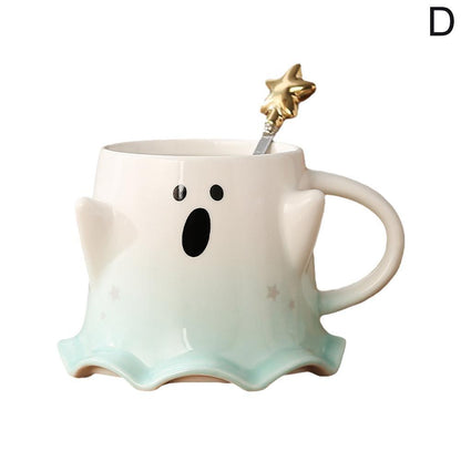 Ghost face mug with oval mouth and gold star stirrer, pale green base and side handle