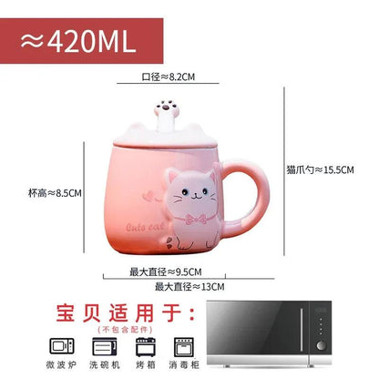 Pink cat ceramic mug with lid and handle, spoon rest on top