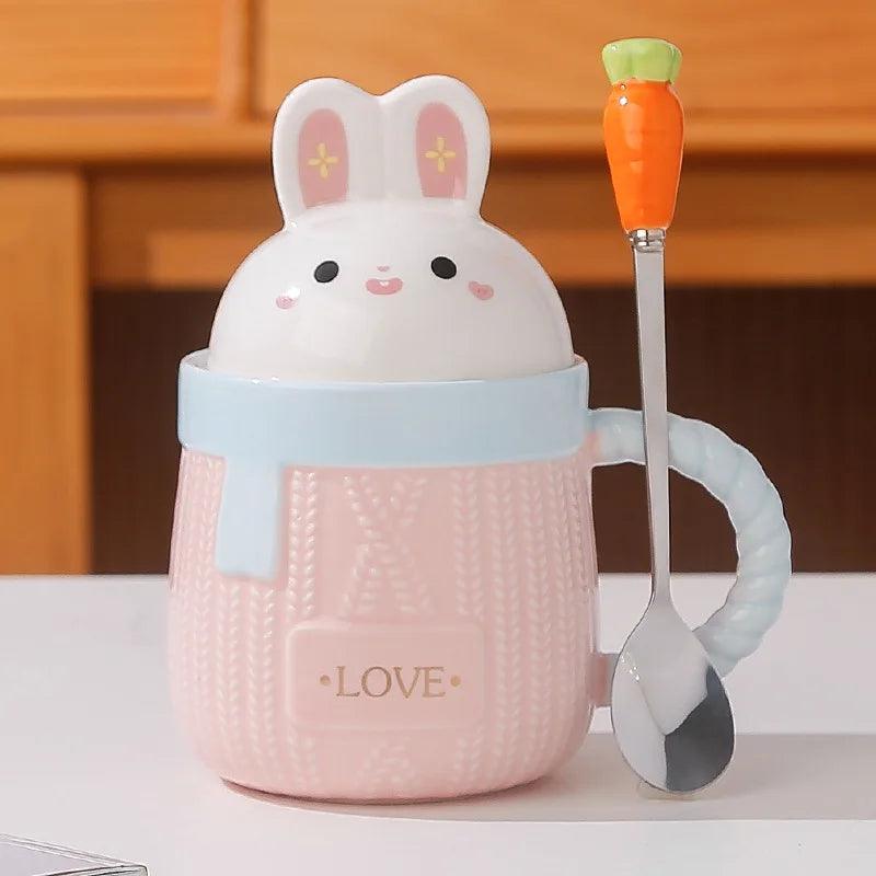 Pink bunny ceramic mug with rabbit lid, textured body, and 'LOVE' text.