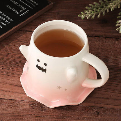 Ghost face mug with coffee inside and wavy mouth; pastel pink base and side handle
