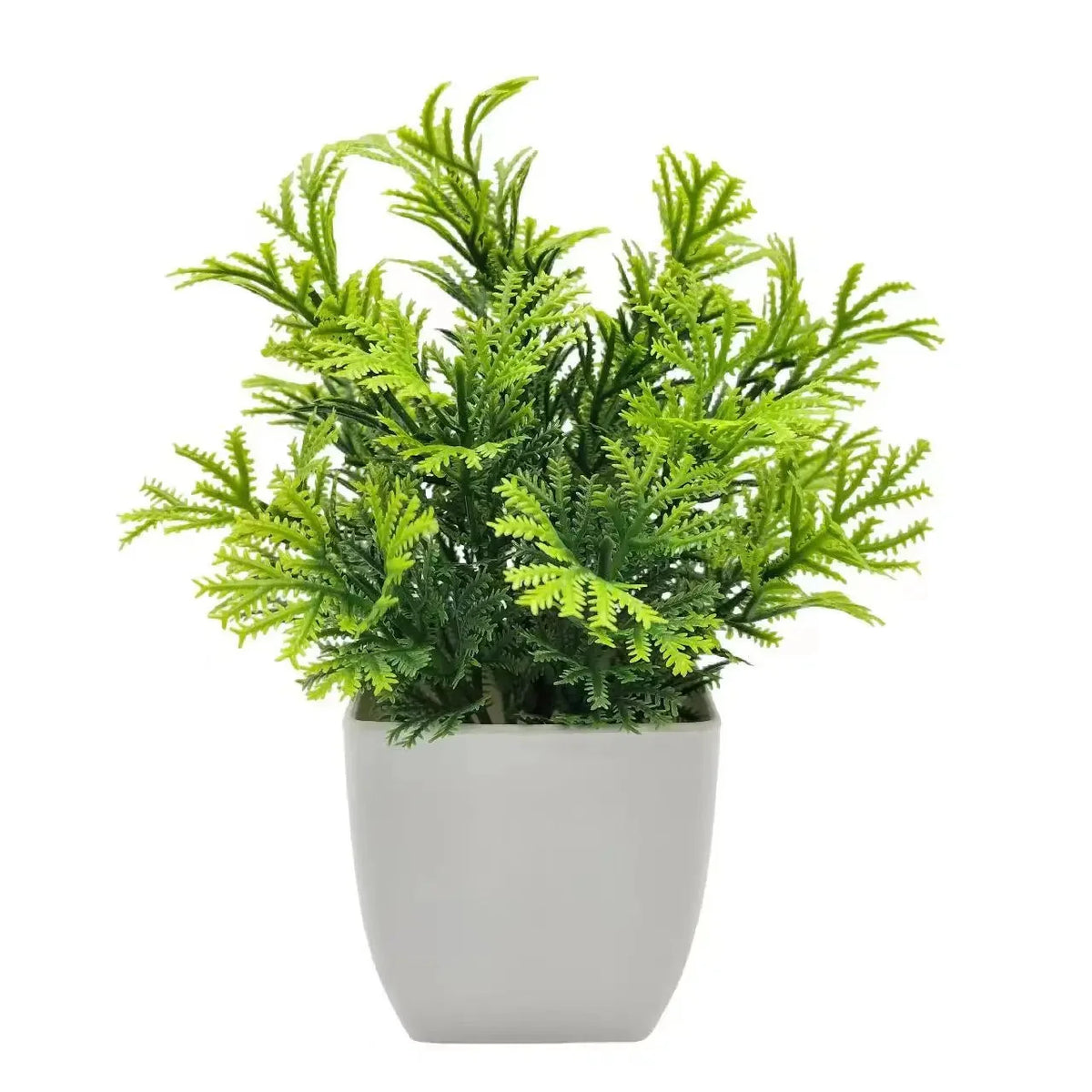 Artificial pine needle plant with dense green foliage in a white plastic pot