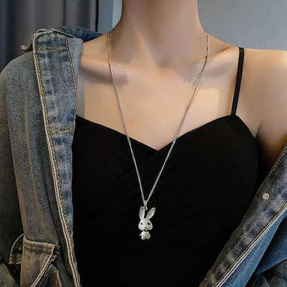 Rhinestone bunny pendant necklace worn at the chest with rabbit head charm