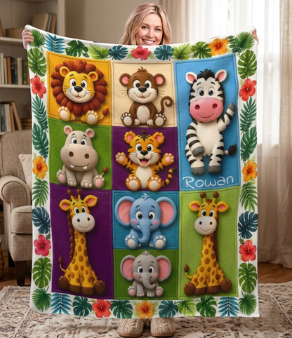 Kids safari animal name blanket held indoors, featuring animal squares and floral leaf border.