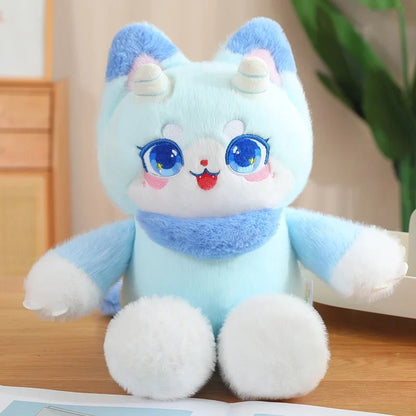 Light blue dragon cat plush toy with large blue eyes, white muzzle, and soft paws