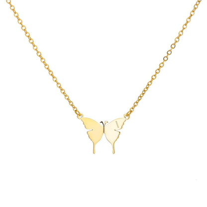Gold-tone butterfly pendant necklace with engraved letter L on two butterfly shapes