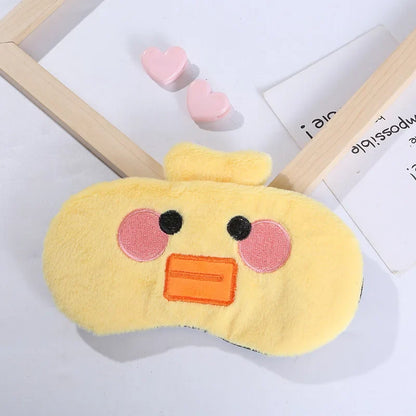 Duck plush sleep mask with yellow fabric, orange beak, and stitched round eyes with rosy cheeks