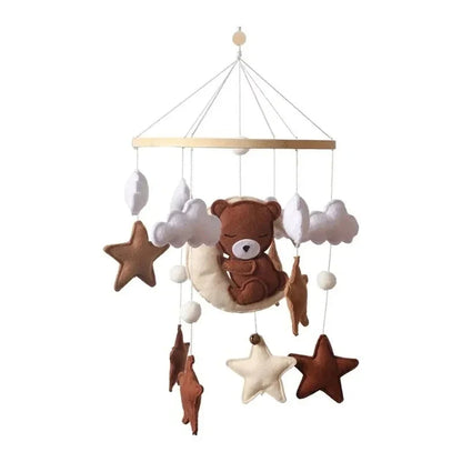 Baby crib mobile with teddy bear, stars, clouds, and moon hanging ornaments