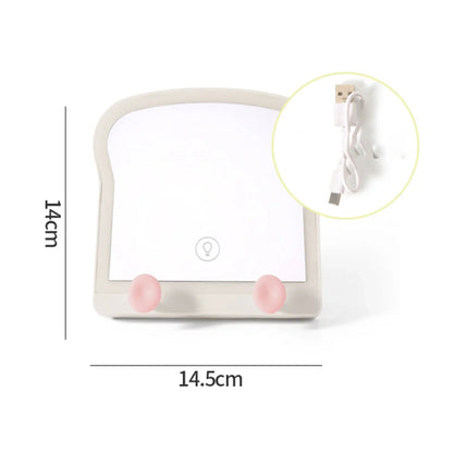 Toast-shaped LED makeup mirror with dimensions 14.5 cm and 14 cm, plus cable plug inset