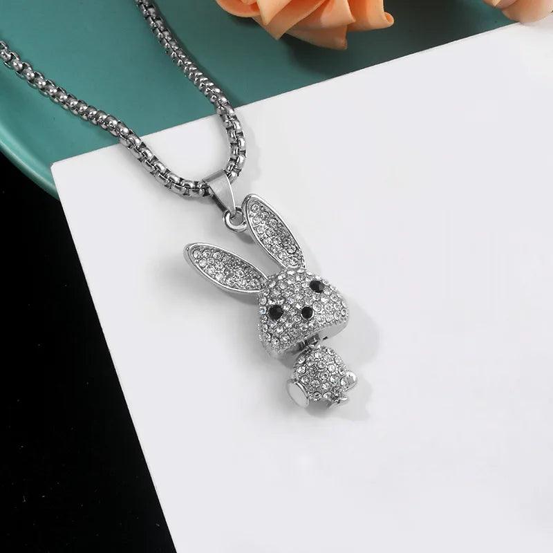 Rhinestone bunny pendant necklace on a chain with oval ears and black eyes