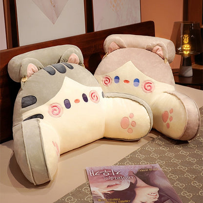 Cat reading pillow with grey cat hood, cream body, spiral swirl face and paw prints