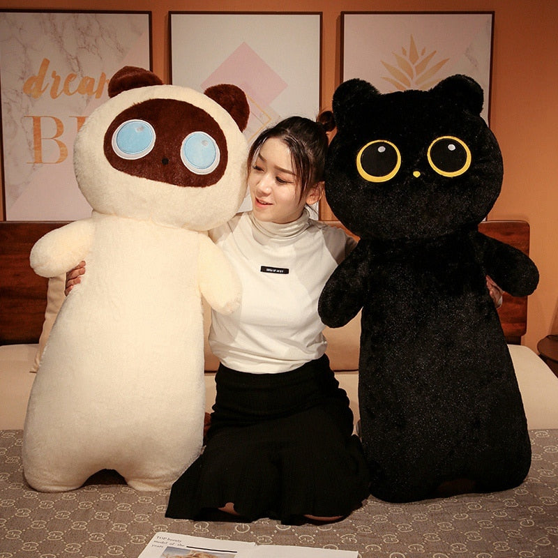 Cat plush body pillow with large black and white cat faces
