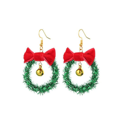 Christmas wreath drop earrings with gold hooks, red bow, and green berry garland charm