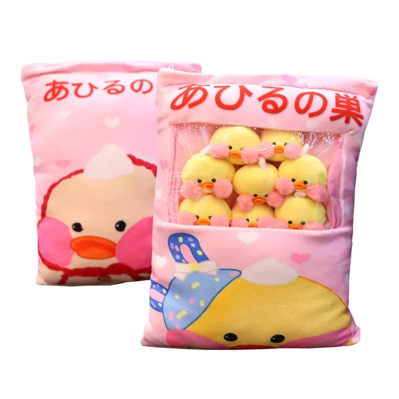Pink pillow with duck plushies inside, stitched front duck face detail