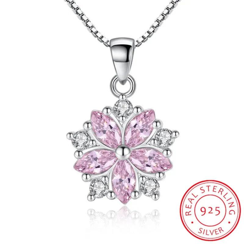 Silver-tone cherry blossom pendant with pink marquise stones and clear accents
