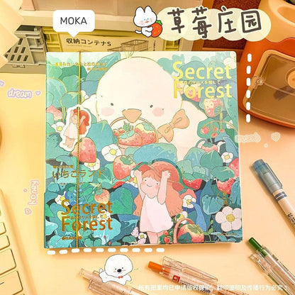 Teal illustrated notebook cover with cute animal characters and 'Secret Forest' lettering