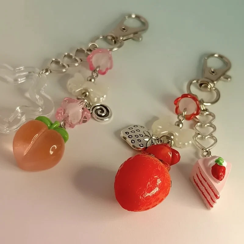 Kawaii fruit bag charms: pink peach, red strawberry, heart and slice dangles