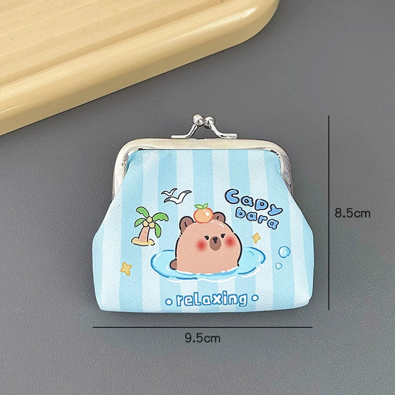 Blue capybara coin purse with kiss-lock metal clasp and relaxing water graphic
