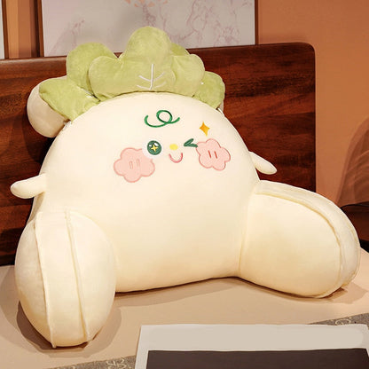 Cabbage-shaped reading pillow with cream body, green leaf hood, smiling face with star