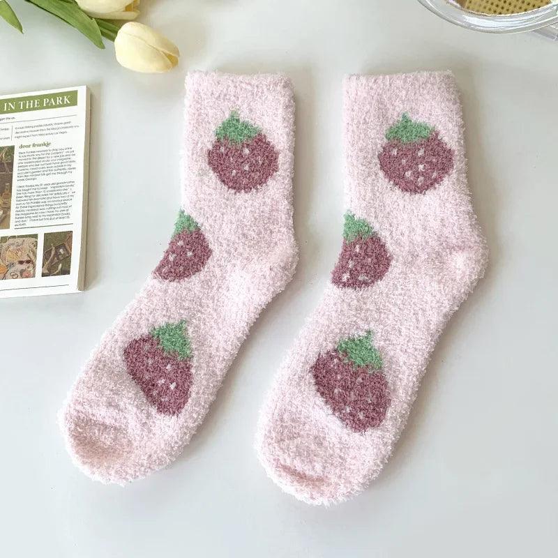 Soft plush sleeping socks, pale pink with dark berry strawberry prints and green leaves