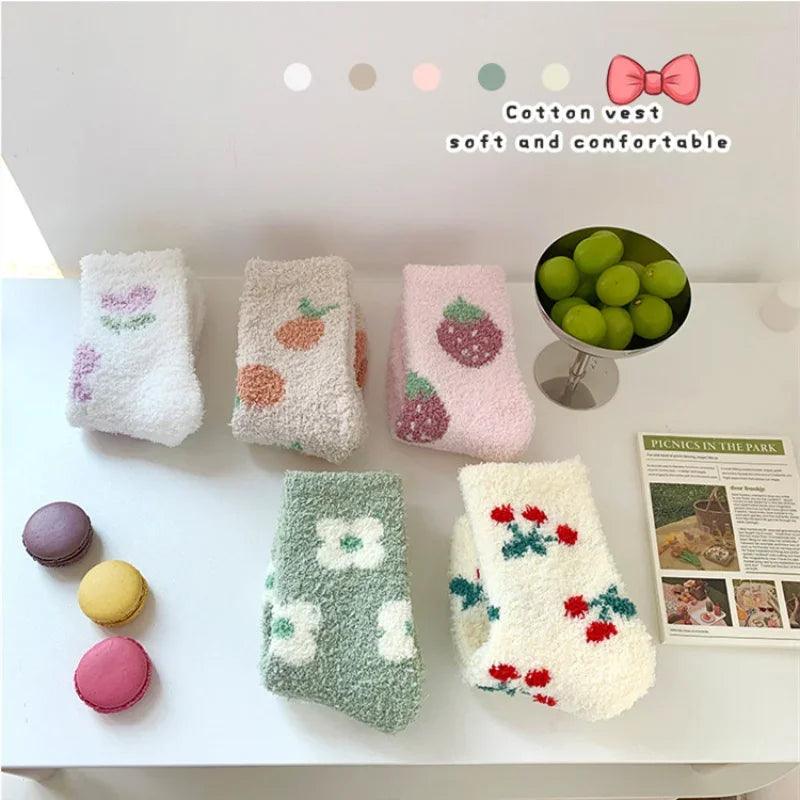 Soft plush sleeping socks in mixed colors with strawberry and heart designs