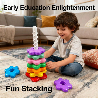 Rainbow stacking tower toy with white poles, purple base pieces, and colorful discs for kids
