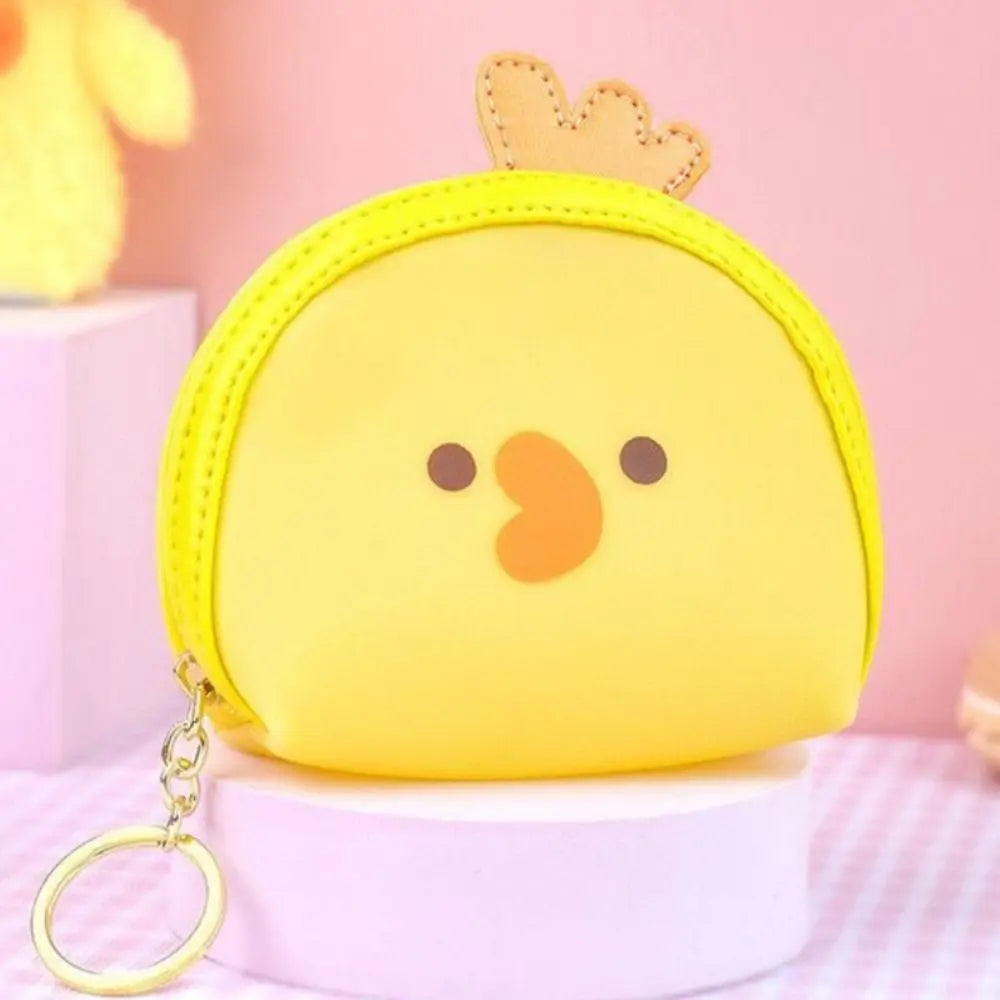 Yellow bear-face coin purse with crown-shaped ears and gold key ring