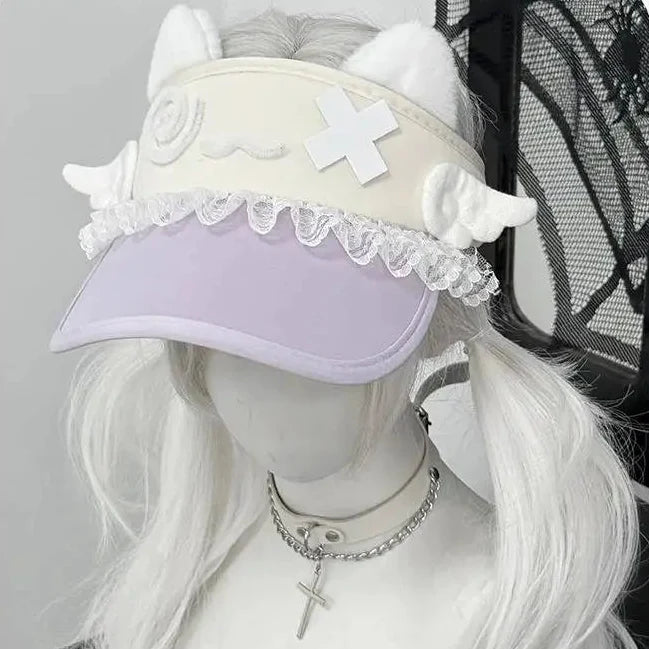 Lavender cat-ear visor with lace ruffle trim and white kitty face patch